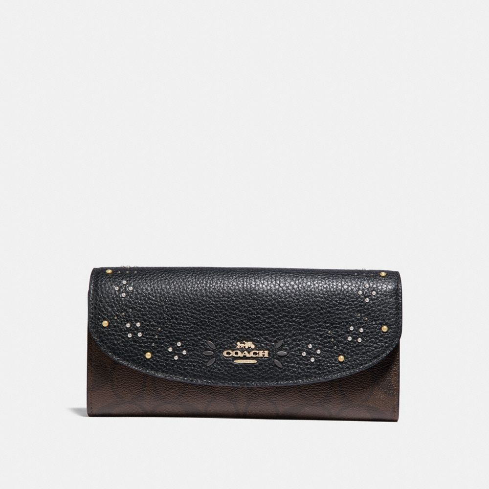 COACH SLIM ENVELOPE WALLET IN SIGNATURE CANVAS WITH RIVETS - BROWN BLACK/MULTI/LIGHT GOLD - F31604