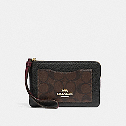 CORNER ZIP WRISTLET IN SIGNATURE CANVAS COLORBLOCK - BROWN/BLACK/LIGHT GOLD - COACH F31613