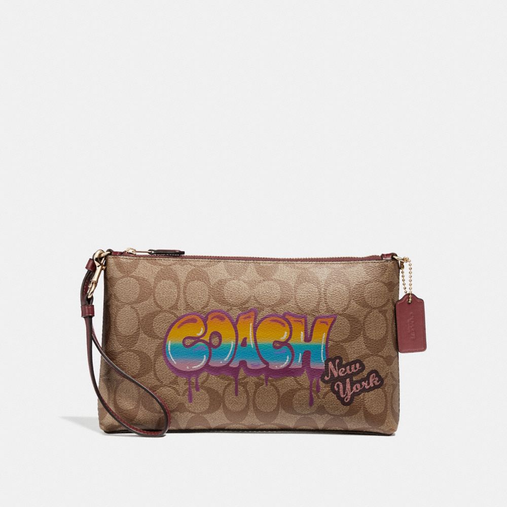 COACH F31615 - LARGE WRISTLET 25 IN SIGNATURE CANVAS WITH GRAFFITI KHAKI/LIGHT GOLD