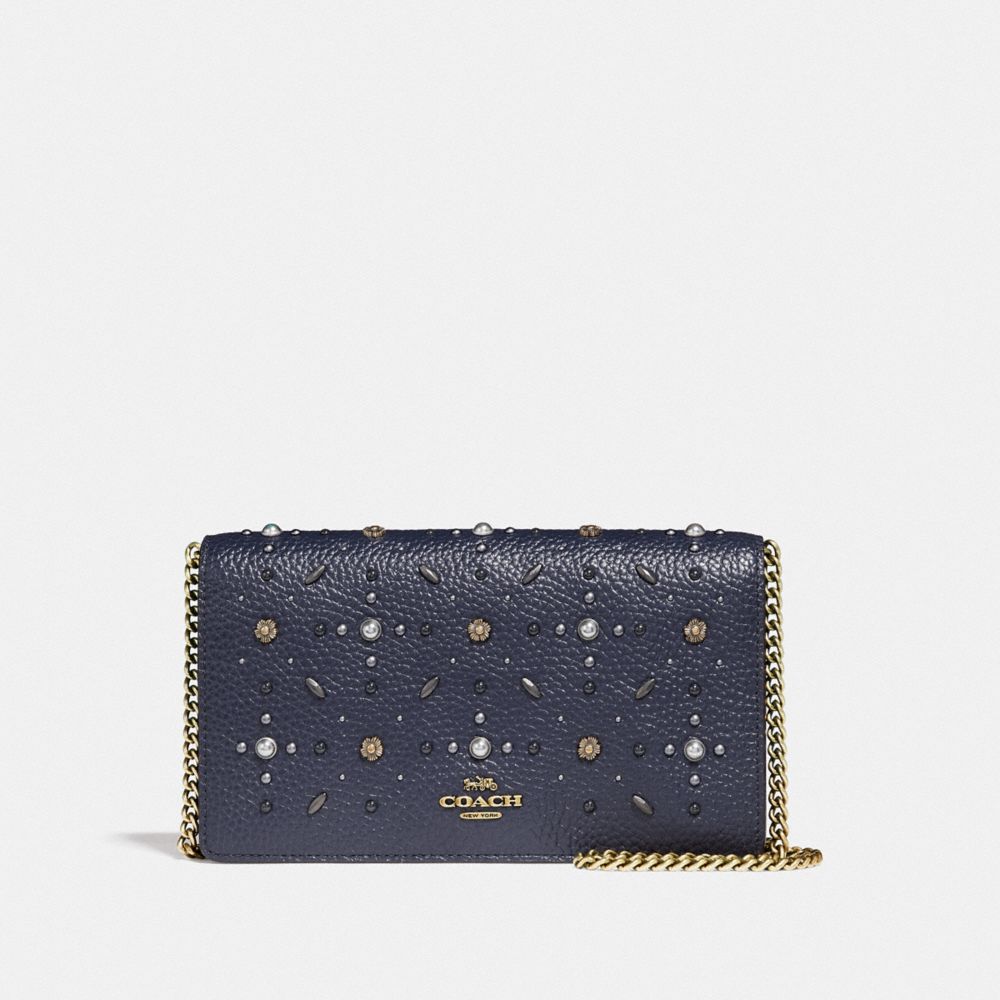 Callie foldover chain clutch with online rivets