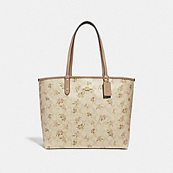 REVERSIBLE CITY ZIP TOTE IN SIGNATURE CANVAS WITH DAISY BUNDLE PRINT - COACH f31776 - light khaki/multi/imitation gold