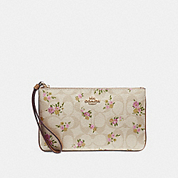 LARGE WRISTLET IN SIGNATURE CANVAS WITH DAISY BUNDLE PRINT - COACH f31784 - light khaki/multi/imitation gold