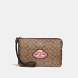 CORNER ZIP WRISTLET IN SIGNATURE CANVAS WITH LIPS - COACH f31892 - KHAKI MULTI /SILVER
