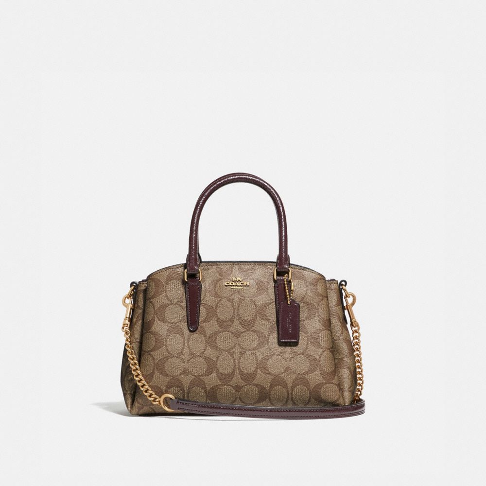 MINI SAGE CARRYALL IN SIGNATURE CANVAS - KHAKI/OXBLOOD MULTI/LIGHT GOLD - COACH F31985