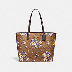 COACH REVERSIBLE CITY TOTE IN SIGNATURE CANVAS WITH MEDLEY BOUQUET PRINT - KHAKI MULTI /light gold - F32084