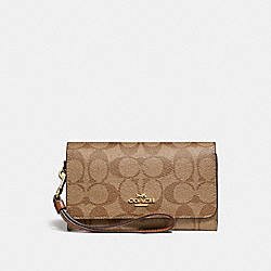 FLAP PHONE WALLET IN SIGNATURE CANVAS - KHAKI/SADDLE 2/LIGHT GOLD - COACH F32484