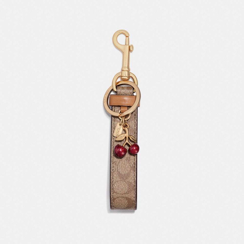 COACH®  Bottle Cap Bag Charm