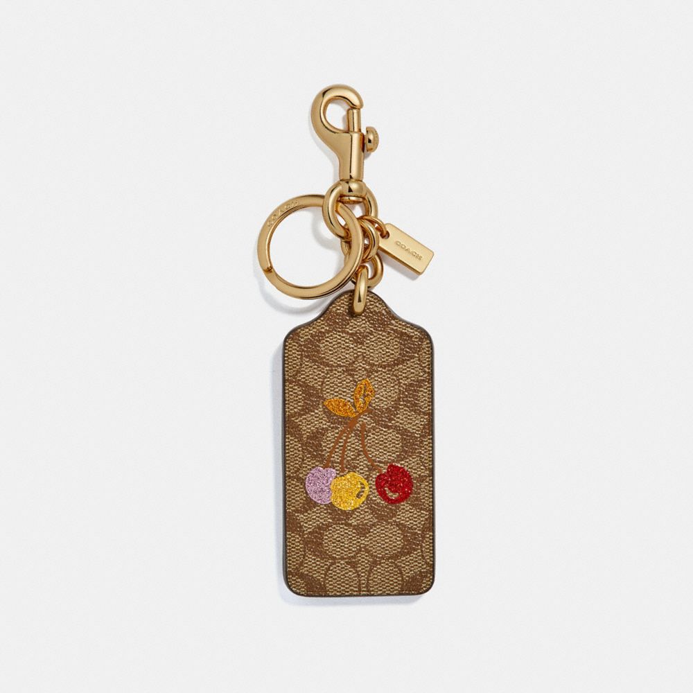 CHERRY HANGTAG IN SIGNATURE CANVAS - COACH f32676 - LIGHT KHAKI/GOLD