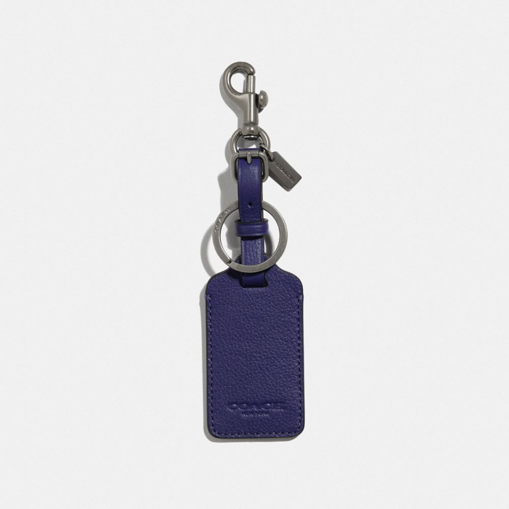 COACH F34586 - LUGGAGE TAG QB/CADET