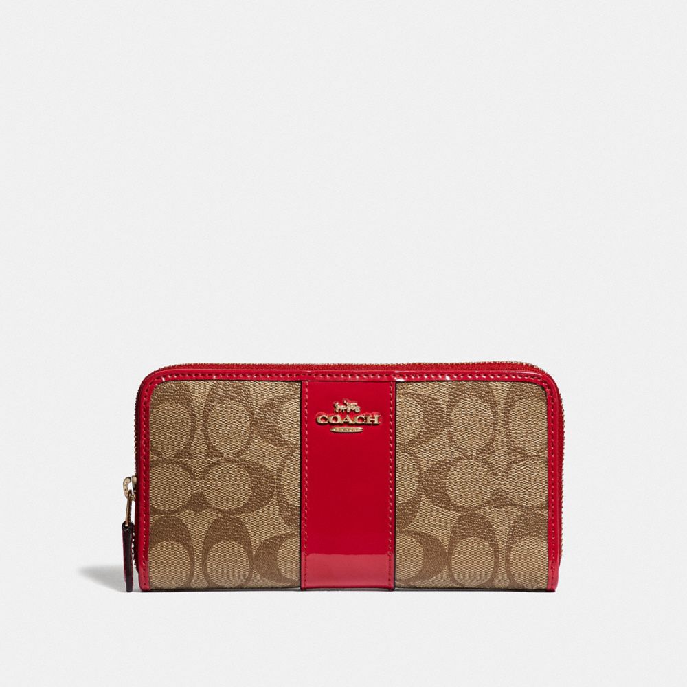 COACH ACCORDION ZIP WALLET IN SIGNATURE CANVAS - KHAKI/TRUE RED/LIGHT GOLD - F35443