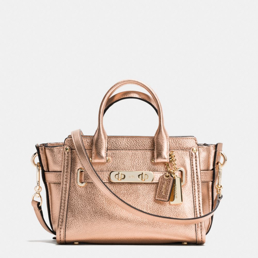 coach rose gold purse
