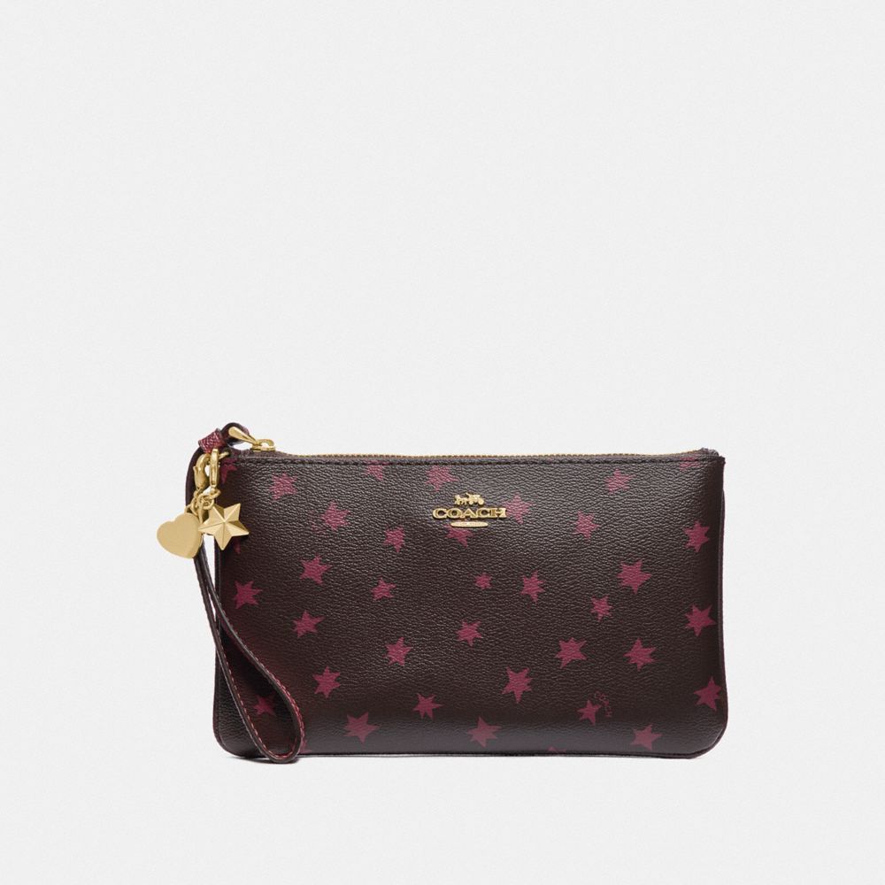 COACH F38647 - BOXED LARGE WRISTLET WITH STAR PRINT AND CHARMS BLACK/MULTI/LIGHT GOLD