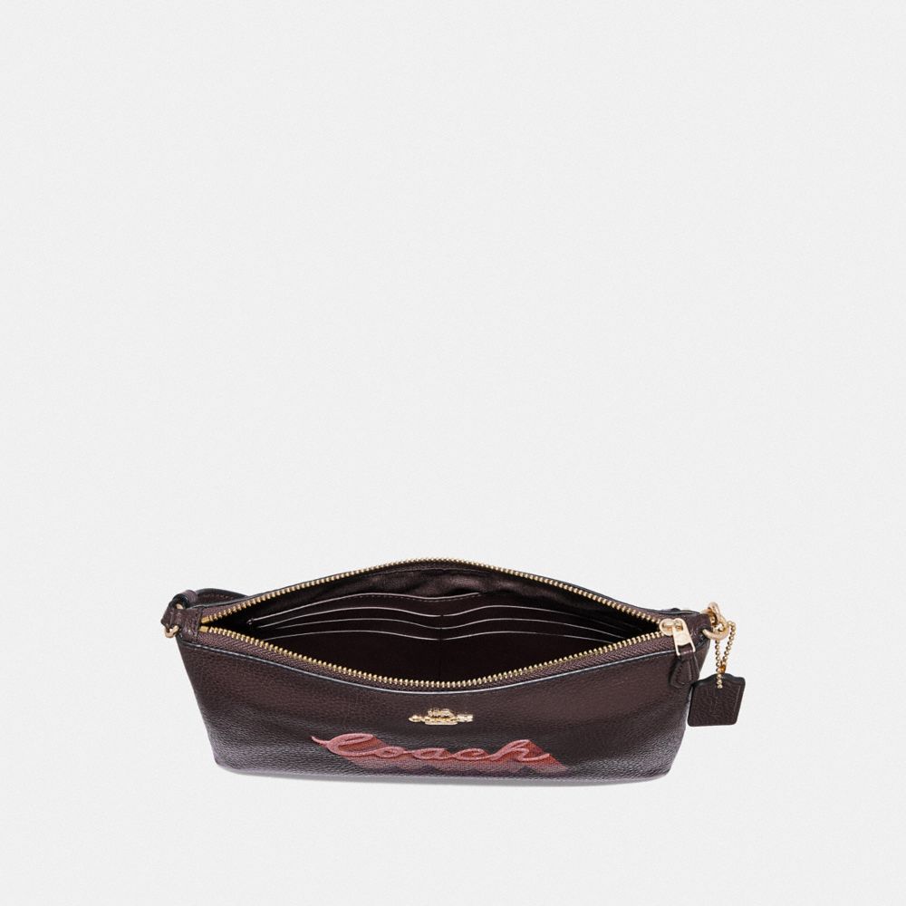 COACH F38686 LARGE WRISTLET 25 WITH NEON COACH SCRIPT OXBLOOD MULTI/LIGHT GOLD