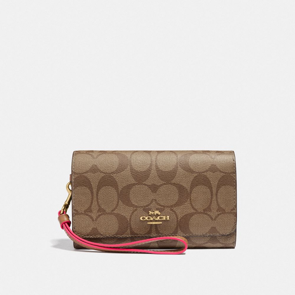 COACH FLAP PHONE WALLET IN SIGNATURE CANVAS - KHAKI/NEON PINK/LIGHT GOLD - F38711