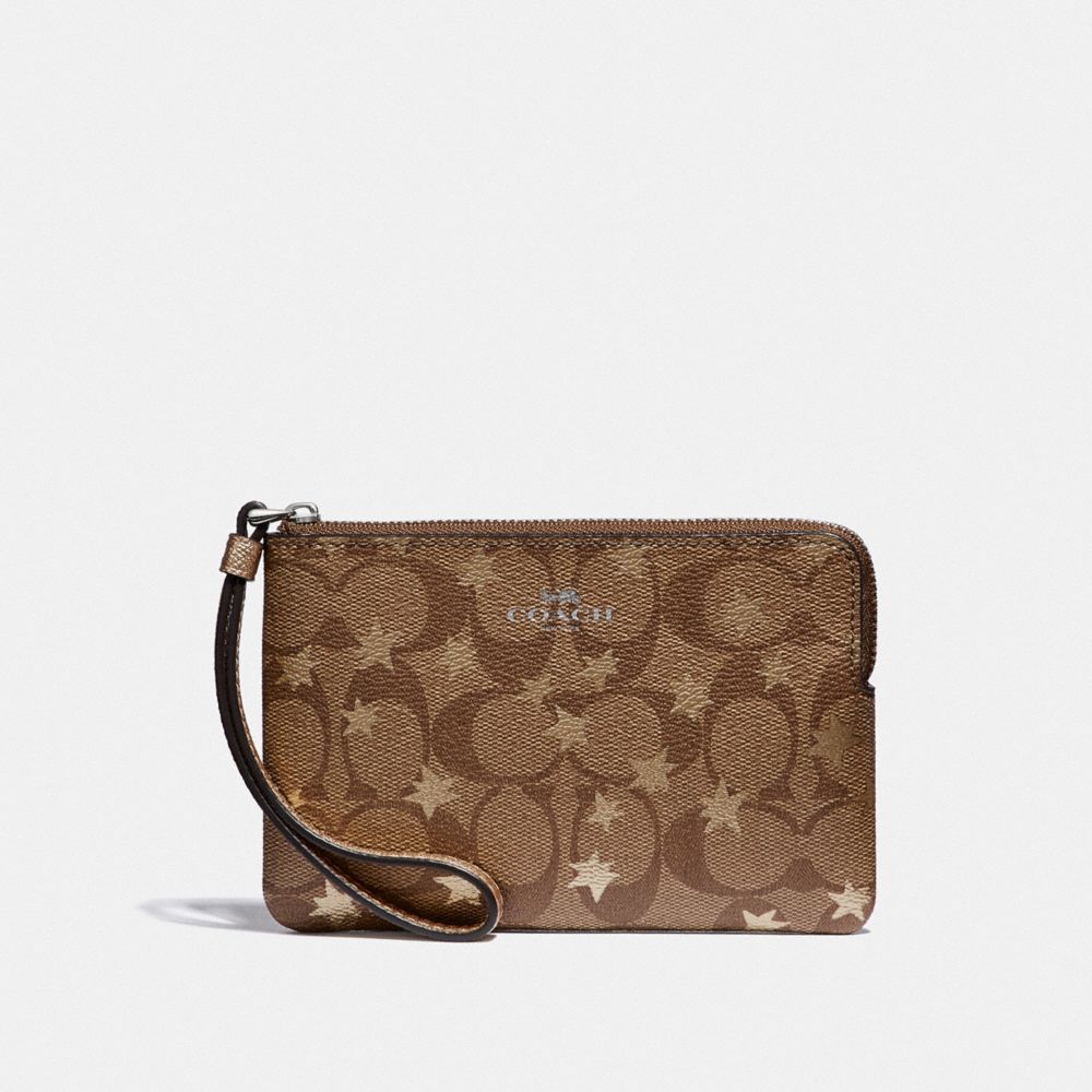 CORNER ZIP WRISTLET IN SIGNATURE CANVAS WITH POP STAR PRINT - KHAKI MULTI /SILVER - COACH F39045