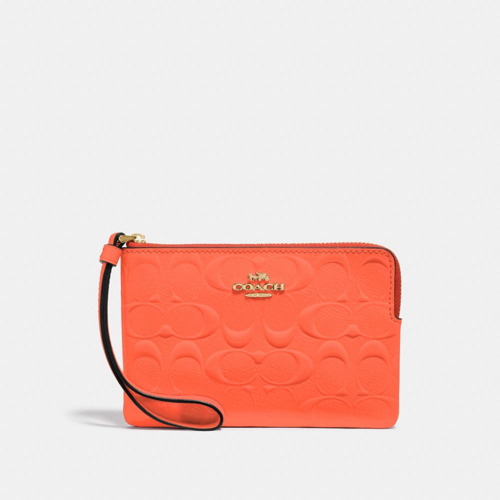 CORNER ZIP WRISTLET IN SIGNATURE LEATHER - NEON ORANGE/LIGHT GOLD - COACH F39151