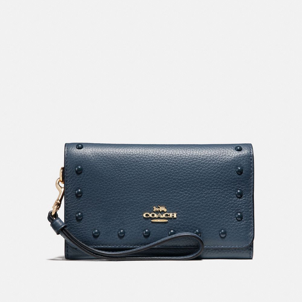 FLAP PHONE WALLET WITH LACQUER RIVETS - COACH F39180 - DENIM/LIGHT GOLD