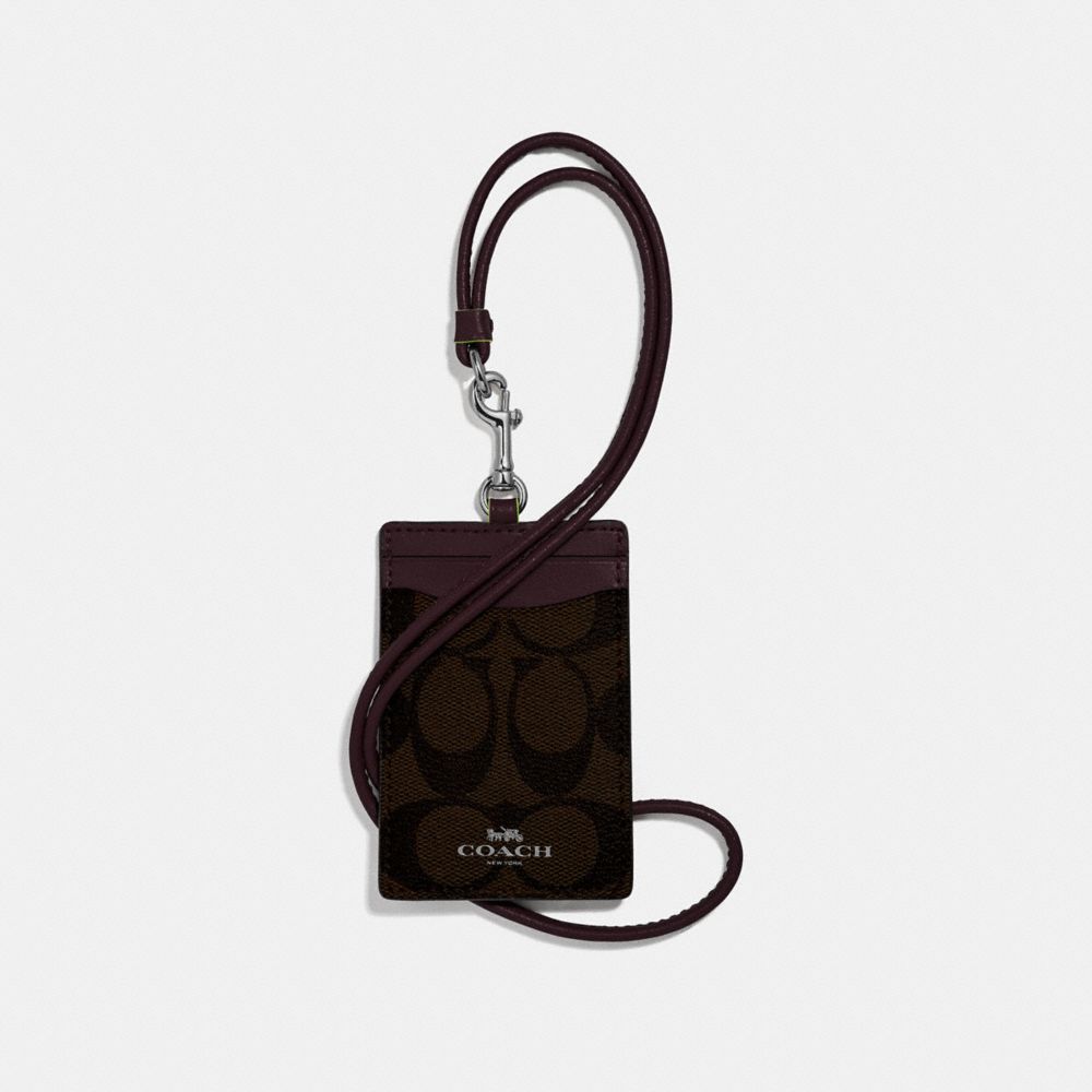 COACH F39211 - ID LANYARD IN SIGNATURE CANVAS BROWN/NEON YELLOW/SILVER
