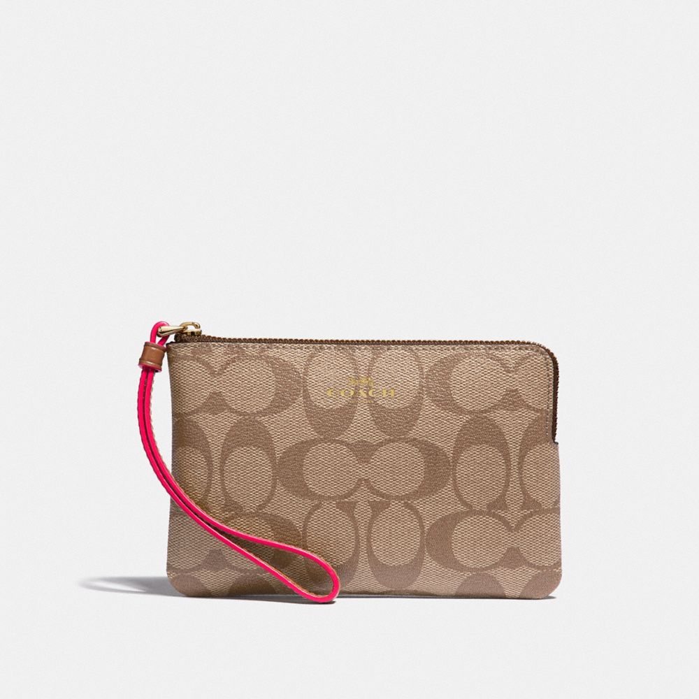 COACH F39213 CORNER ZIP WRISTLET IN SIGNATURE CANVAS KHAKI/NEON PINK/LIGHT GOLD