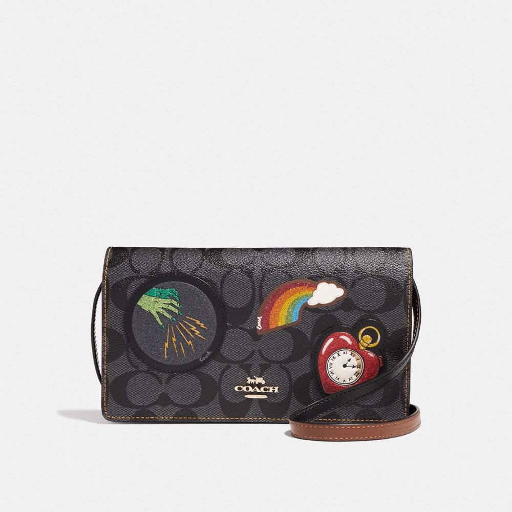 HAYDEN FOLDOVER CROSSBODY CLUTCH IN SIGNATURE CANVAS WITH WIZARD OF OZ PATCHES - BLACK SMOKE/BLACK MULTI/LIGHT GOLD - COACH F39268