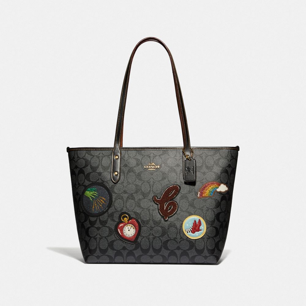 CITY ZIP TOTE IN SIGNATURE CANVAS WITH WIZARD OF OZ PATCHES - F39465 - BLACK SMOKE MULTI/LIGHT GOLD
