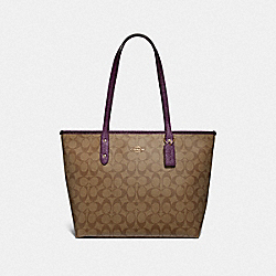 CITY ZIP TOTE IN SIGNATURE CANVAS - KHAKI/METALLIC RASPBERRY/LIGHT GOLD - COACH F39523