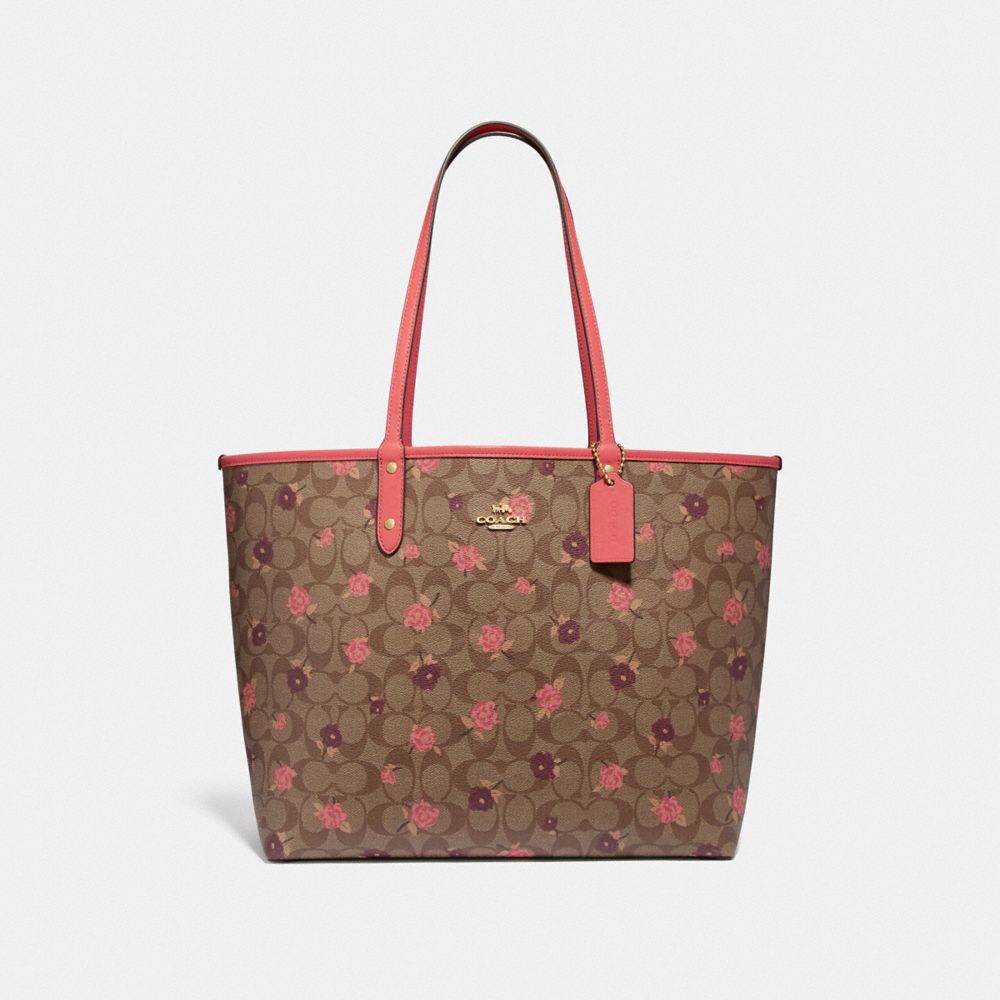 REVERSIBLE CITY TOTE IN SIGNATURE CANVAS WITH TOSSED PEONY PRINT - KHAKI/PINK MULTI/IMITATION GOLD - COACH F45348