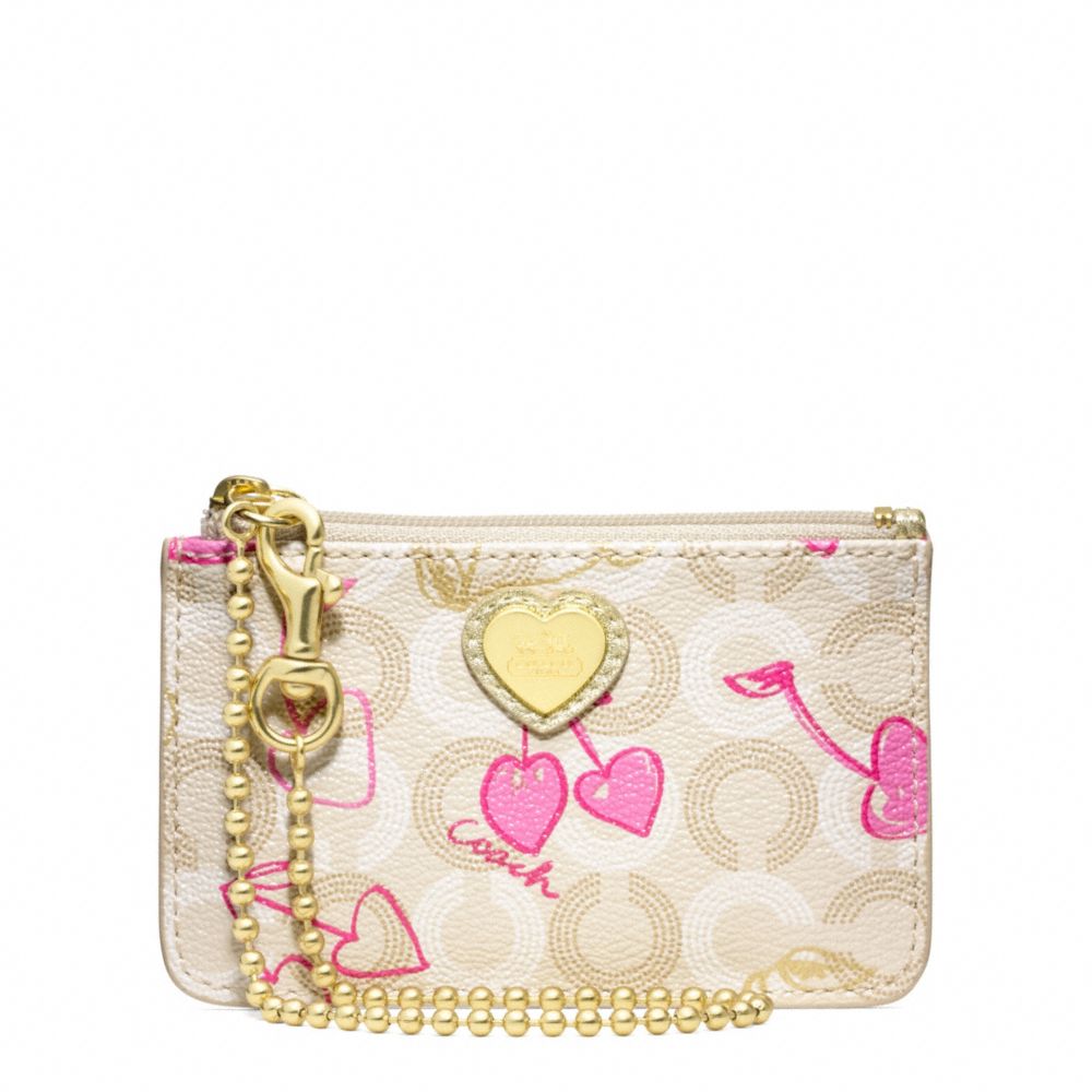 COACH Waverly Signature Small Wristlet in Pink