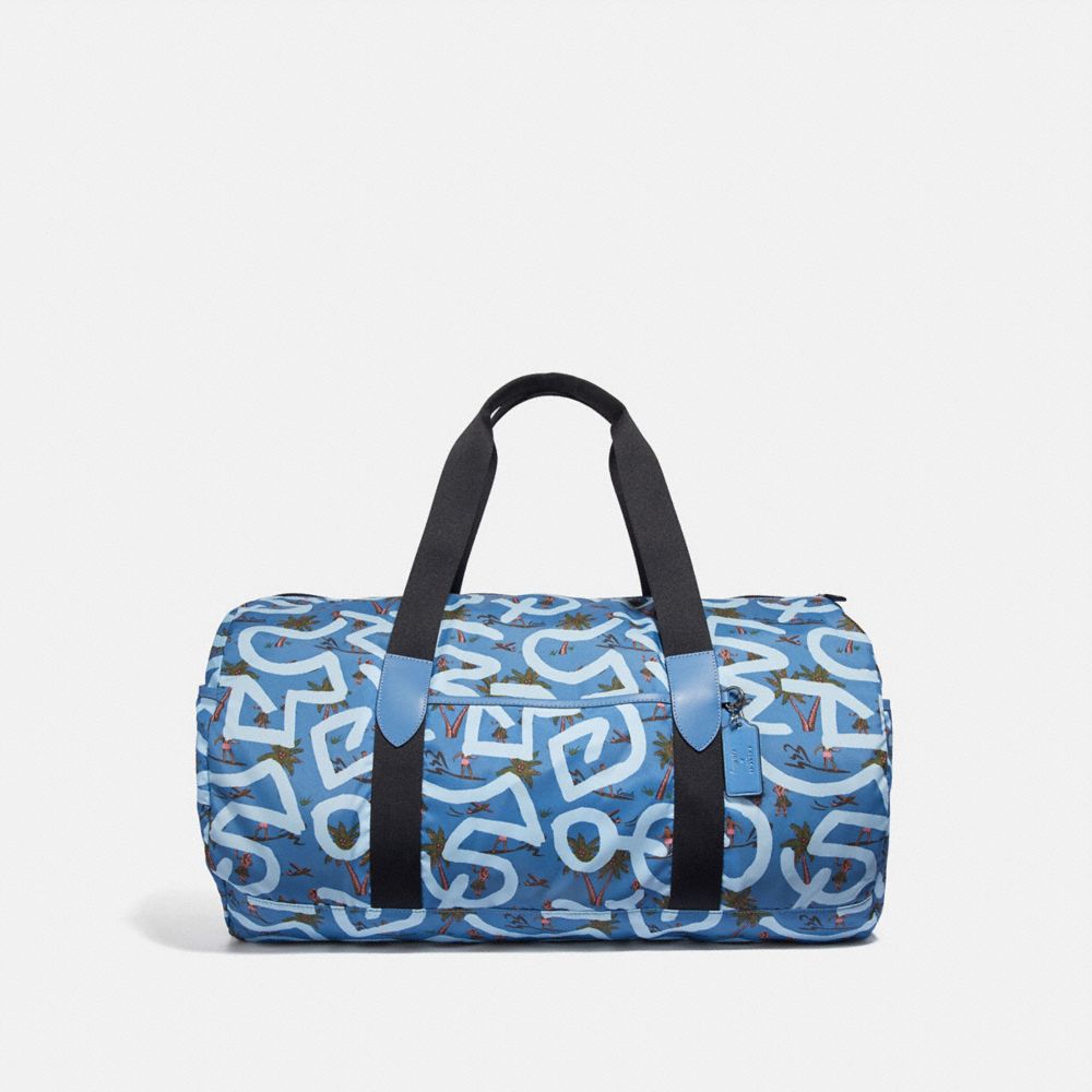 COACH KEITH HARING PACKABLE DUFFLE WITH HULA DANCE PRINT - SKY BLUE MULTI/BLACK ANTIQUE NICKEL - F50164