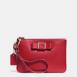 SMALL WRISTLET WITH BOW IN CROSSGRAIN LEATHER - LIGHT GOLD/RED - COACH F52629