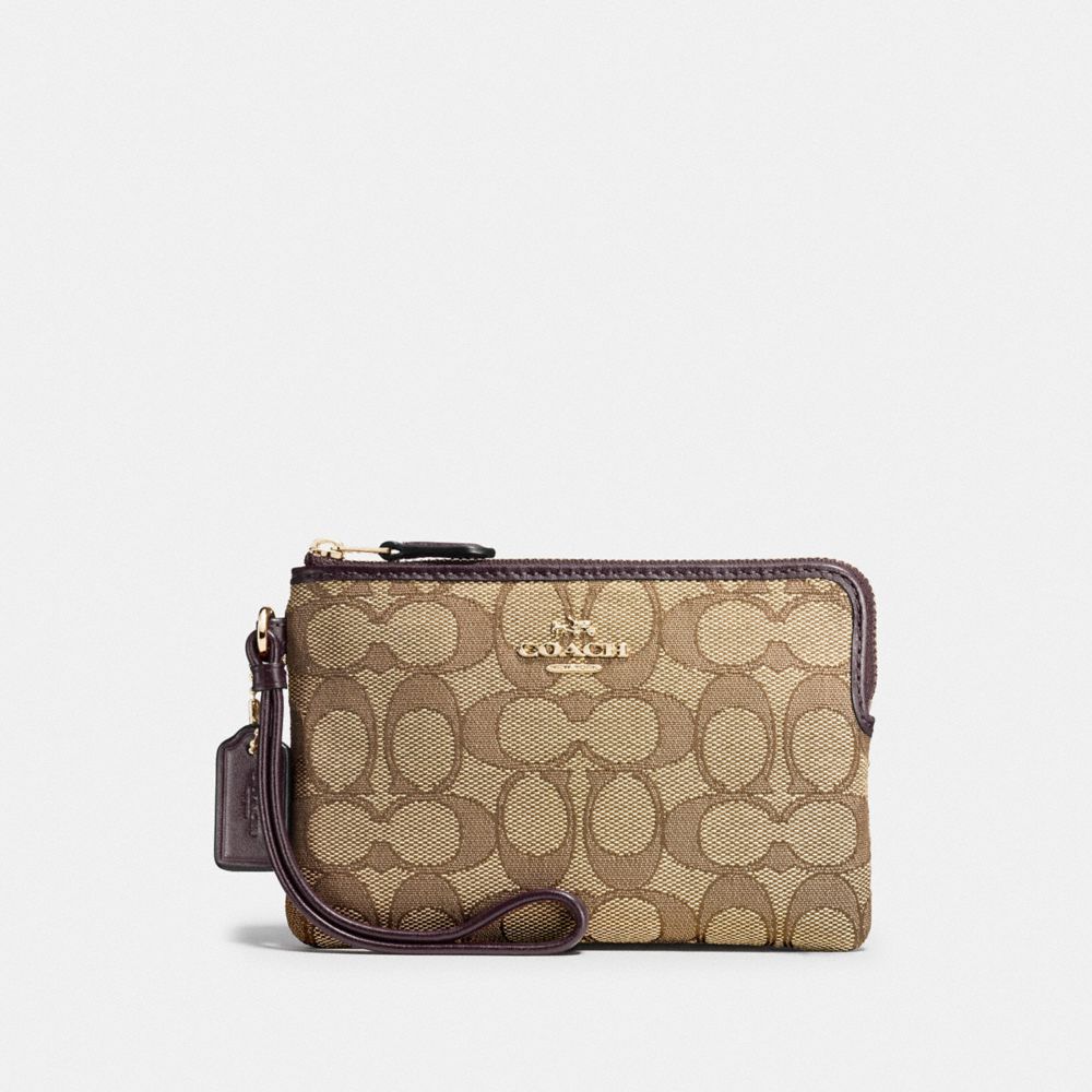 COACH CORNER ZIP WRISTLET IN OUTLINE SIGNATURE - IMITATION GOLD/KHAKI/BROWN - F54627