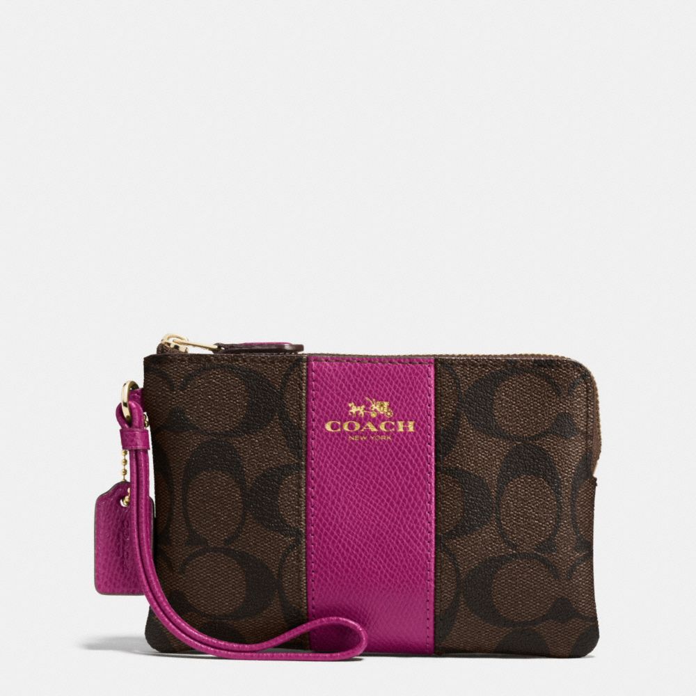 COACH CORNER ZIP WRISTLET IN SIGNATURE COATED CANVAS WITH LEATHER STRIPE - IMITATION GOLD/BROWN/FUCHSIA - F54629