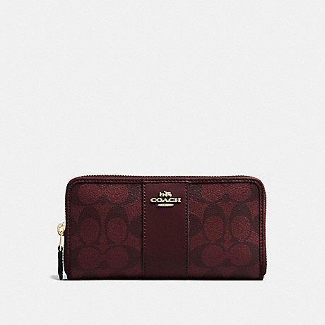 COACH ACCORDION ZIP WALLET IN SIGNATURE CANVAS - OXBLOOD 1/LIGHT GOLD - F54630