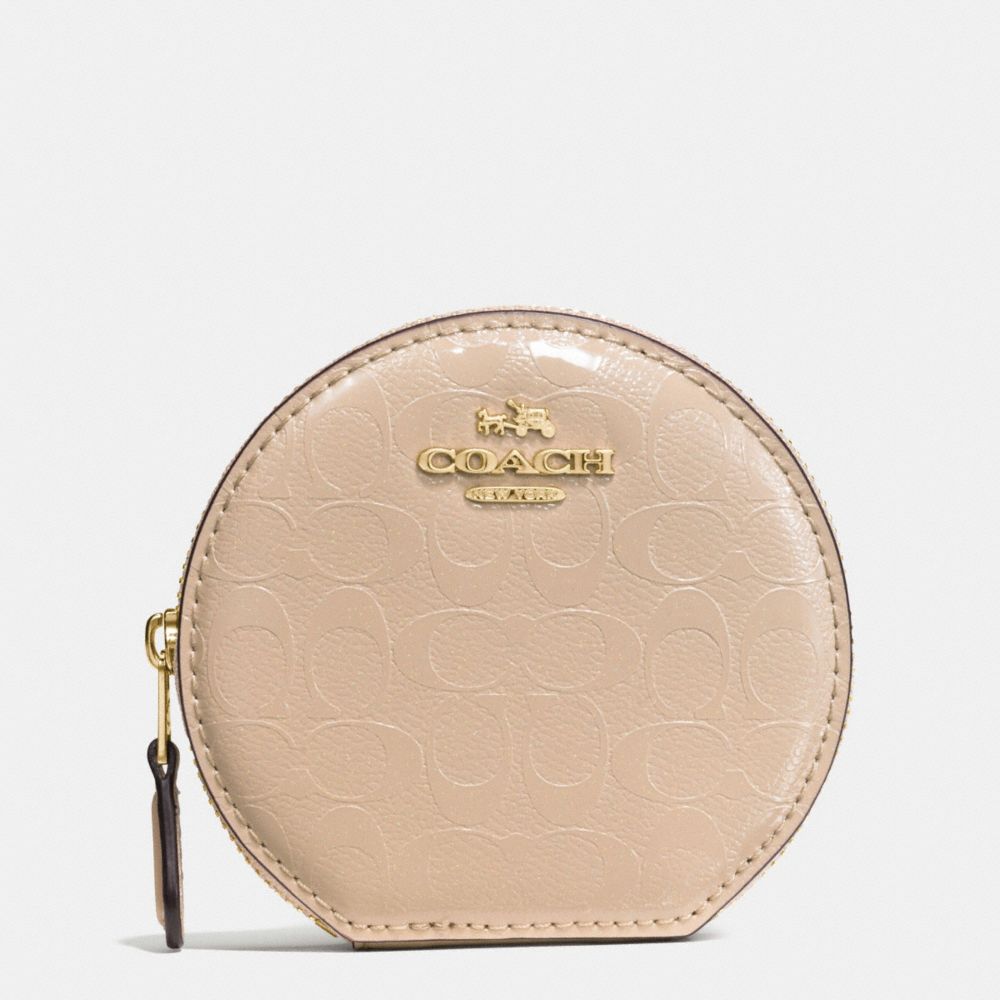 round coach purse