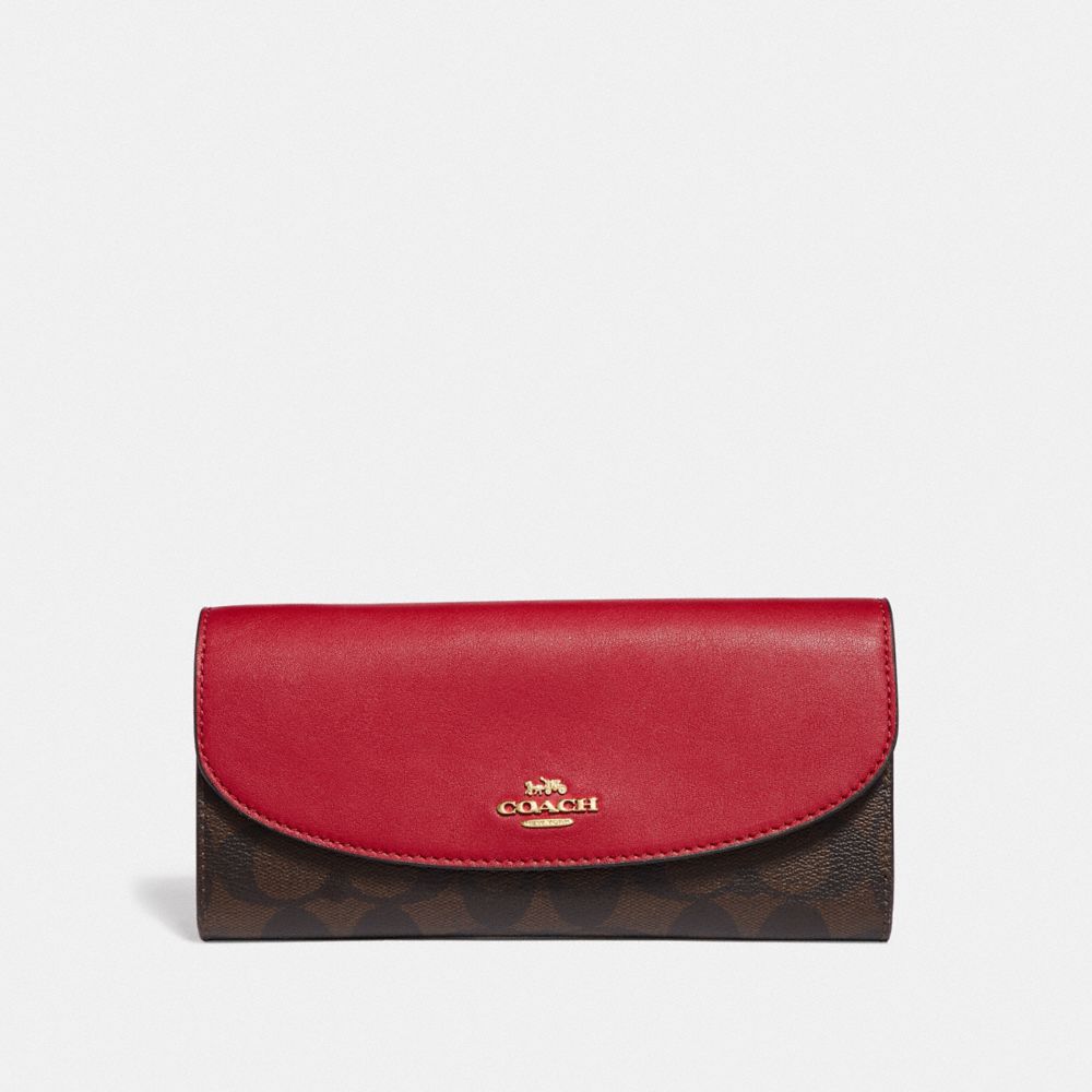 COACH LUNAR NEW YEAR SLIM ENVELOPE WALLET IN COLORBLOCK SIGNATURE CANVAS - BROWN BLACK/PINK MULTI/IMITATION GOLD - F55616