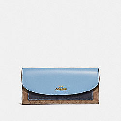 SLIM ENVELOPE WALLET IN COLORBLOCK SIGNATURE CANVAS - COACH f56494 - KHAKI/MIDNIGHT POOL/LIGHT GOLD
