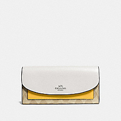 COACH SLIM ENVELOPE WALLET IN COLORBLOCK SIGNATURE COATED CANVAS - SILVER/LT KHAKI - F56494