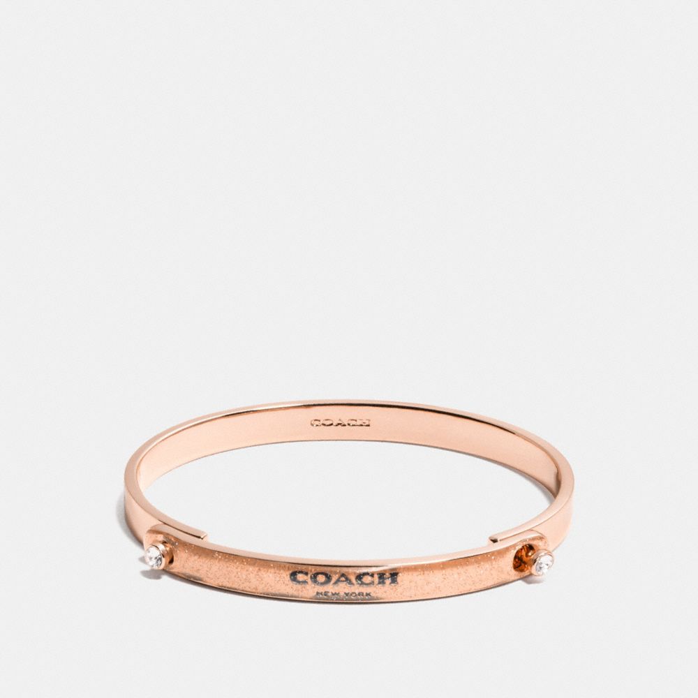 COACH F56783 - GLITTER COACH STONE TENSION BANGLE ROSEGOLD