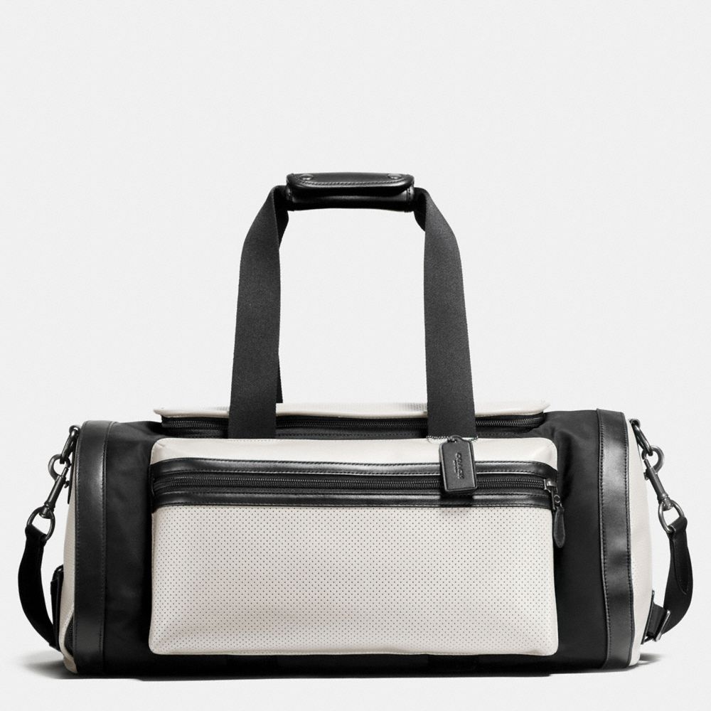 COACH f56875 TERRAIN GYM BAG IN PERFORATED MIXED MATERIALS CHALK/BLACK