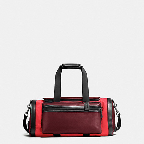 COACH TERRAIN GYM BAG IN PERFORATED MIXED MATERIALS - BRICK RED/BRIGHT RED - f56875