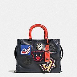 COACH F57231 - ROGUE WITH VARSITY PATCHES BP/NAVY