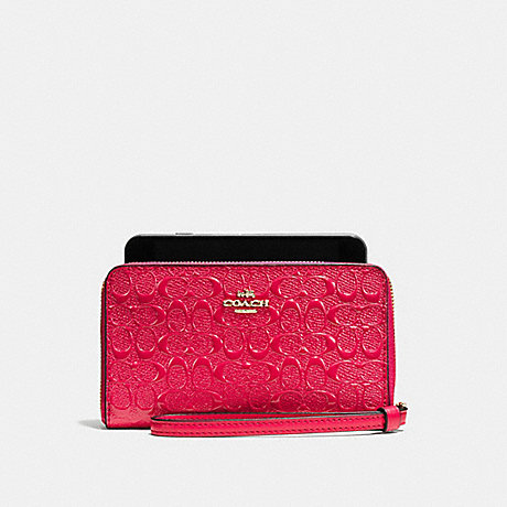 COACH PHONE WALLET IN SIGNATURE DEBOSSED PATENT LEATHER - IMITATION GOLD/BRIGHT PINK - f57469