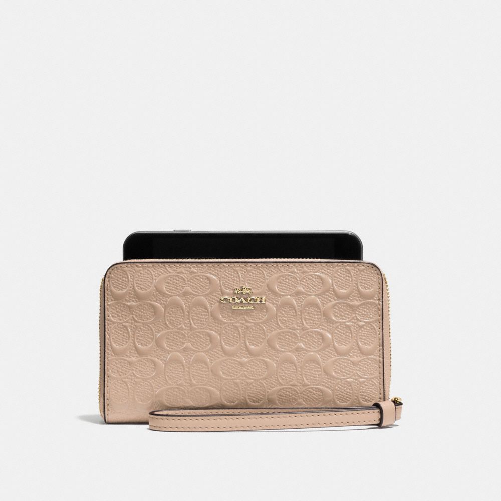 COACH PHONE WALLET IN SIGNATURE DEBOSSED PATENT LEATHER - IMITATION GOLD/PLATINUM - f57469