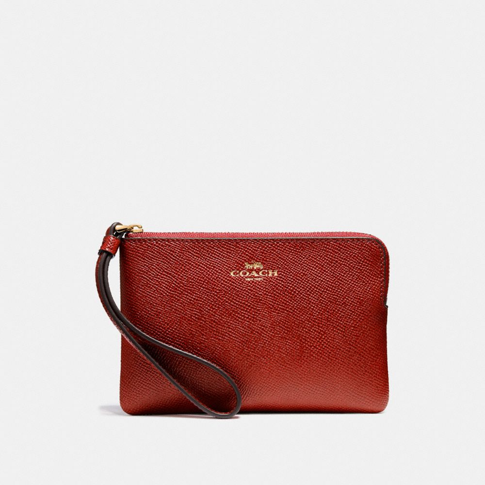 COACH CORNER ZIP WRISTLET - LIGHT GOLD/DARK RED - f58032