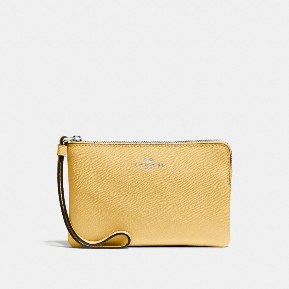 CORNER ZIP WRISTLET - DAISY/SILVER - COACH F58032