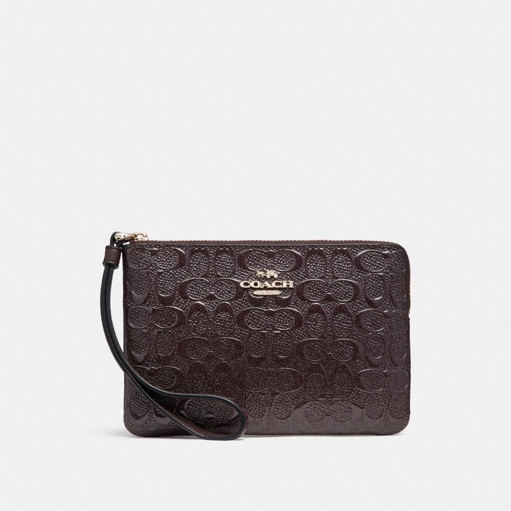 COACH F58034 - CORNER ZIP WRISTLET IN SIGNATURE DEBOSSED PATENT LEATHER LIGHT GOLD/OXBLOOD 1