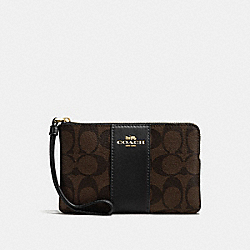 CORNER ZIP WRISTLET IN SIGNATURE COATED CANVAS WITH LEATHER STRIPE - COACH f58035 - IMITATION GOLD/BROWN/BLACK