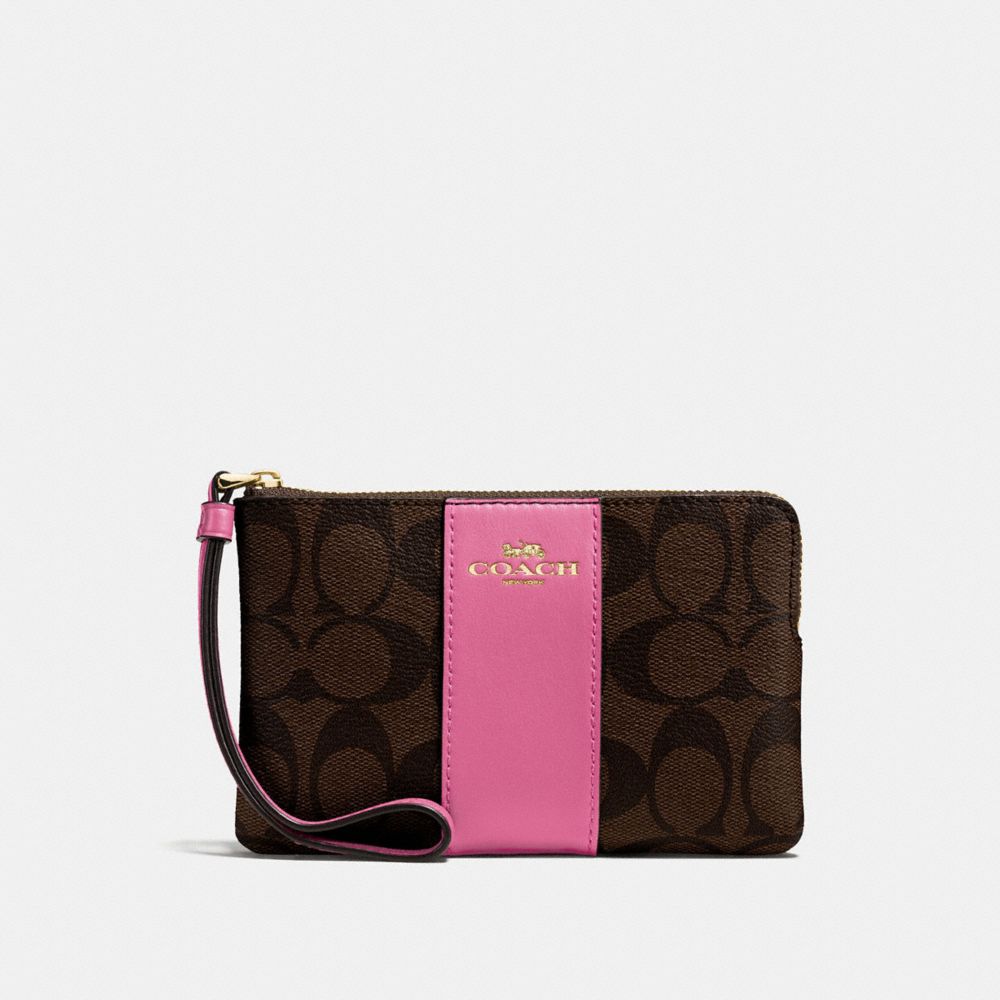 COACH CORNER ZIP WRISTLET IN SIGNATURE CANVAS - brown /pink/light gold - f58035