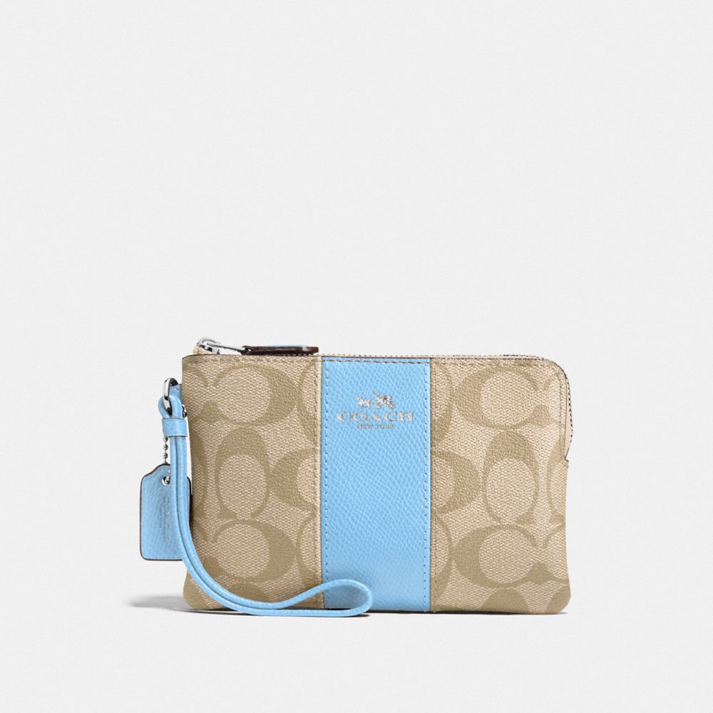 COACH CORNER ZIP WRISTLET IN SIGNATURE CANVAS - LT KHAKI/CORNFLOWER/SILVER - F58035