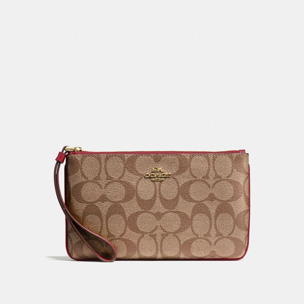 COACH LARGE WRISTLET IN SIGNATURE CANVAS - KHAKI/CHERRY/LIGHT GOLD - F58695